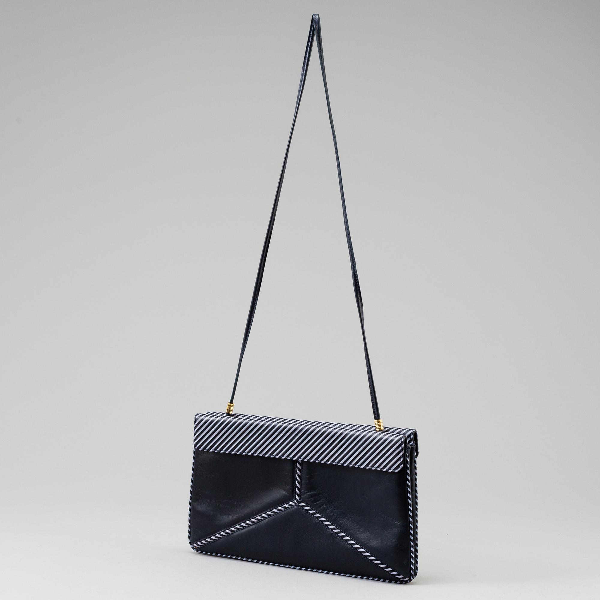 VALENTINO GARAVANI, a leather clutch from Les Sacs, 1980's.