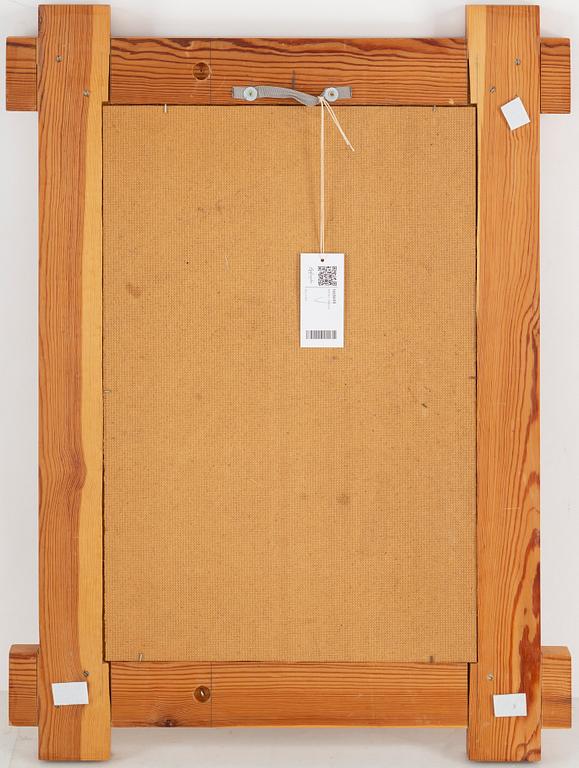 A 1980's pine mirror.