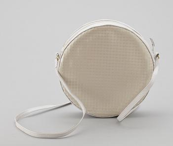 A white leather shoulder bag by Charles Jourdan.