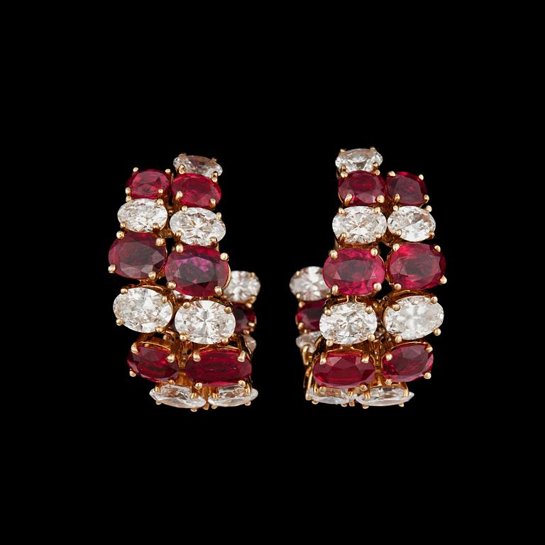 A pair of David Morris, ruby, total carat weight ca 10.35 cts and oval-cut diamonds, tot. circa 7.10 cts, earrings.
