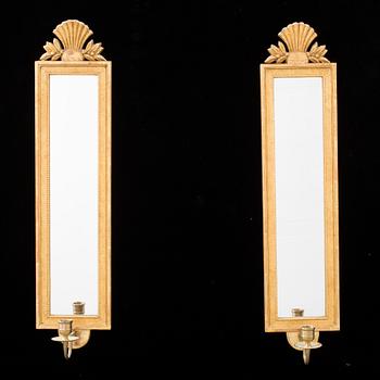 A pair of Swedish mid 20th century Gustavian style wall sconces from Kurt Ekvall in Nyköping.