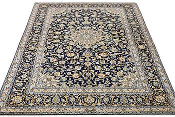 A Kashan carpet, c. 343 x 236 cm.