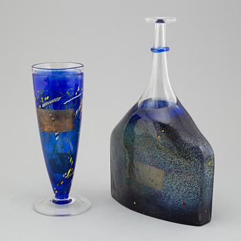 A glass flask and vase by Bertil Vallien, kosta boda, signed and numbered 89254 and 7049250, late 20th century.