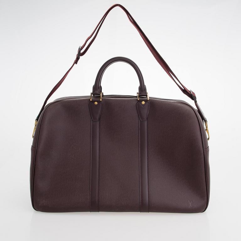 Louis Vuitton, 'Taiga Kendall PM' Bag.