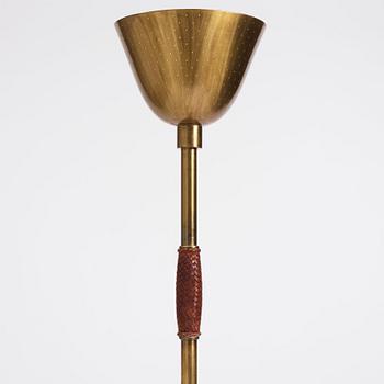 Carl-Axel Acking, a brass and leather floor lamp, designed for the Stockholm Association of Crafts in 1939.