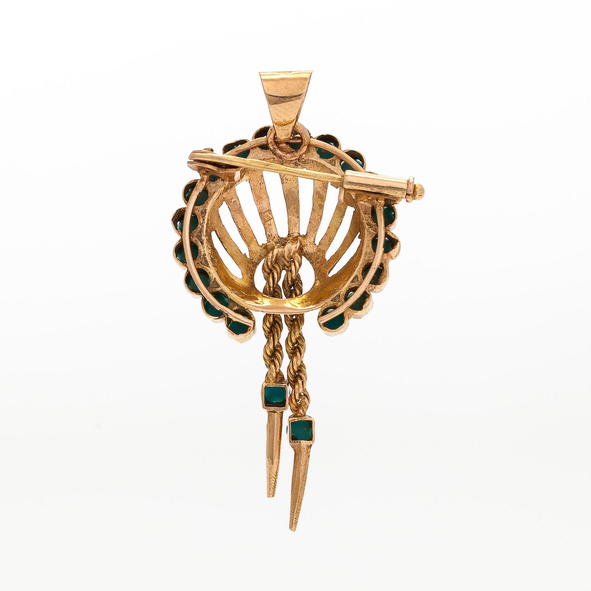 An 18K gold brooch/pendant, with turquoises.