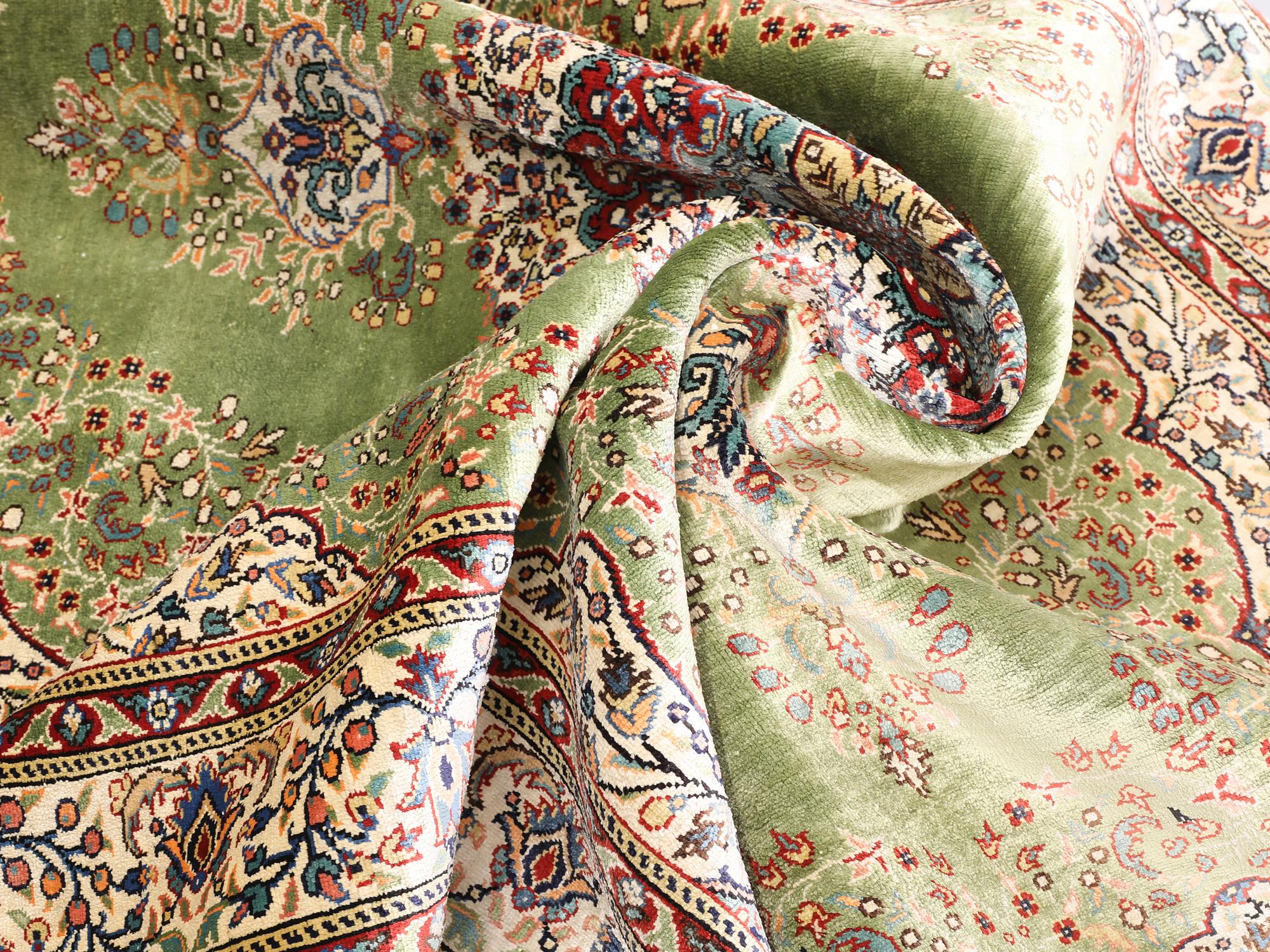 A semi-antique silk Kaysari rug, Turkey, 152 x 103 cm.
