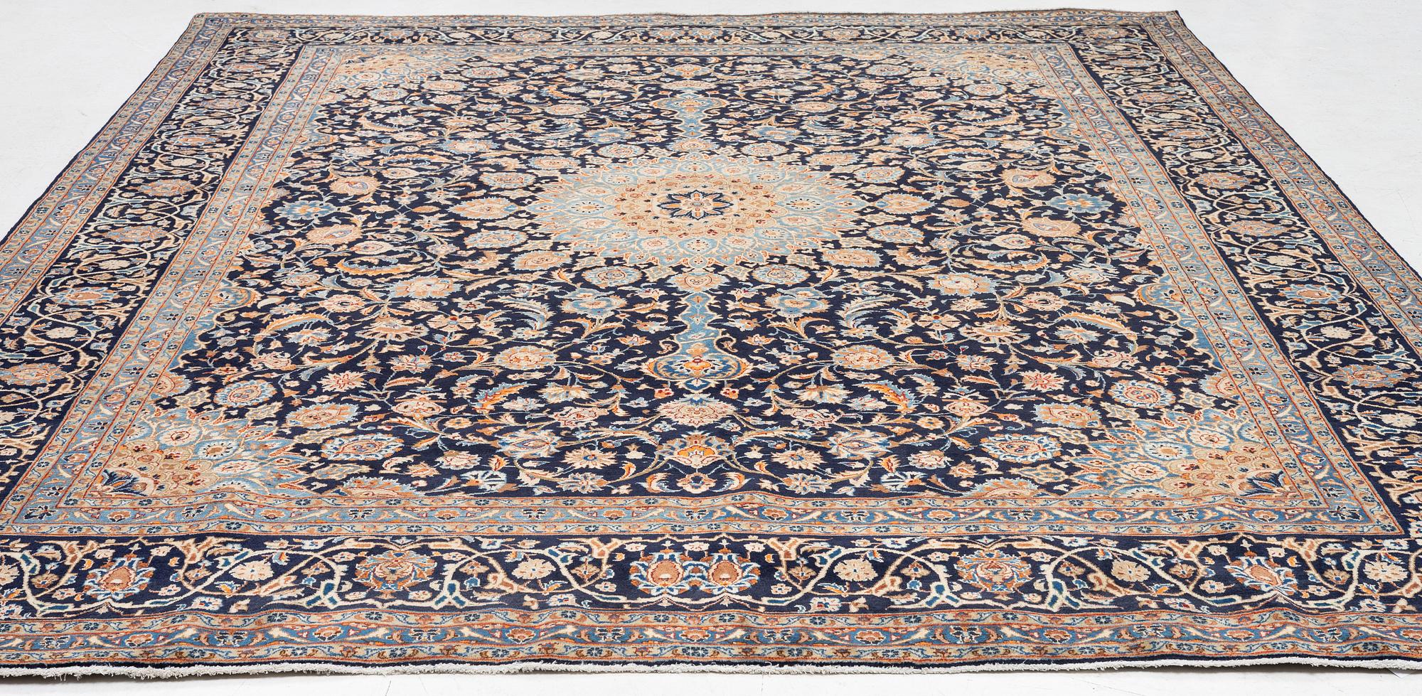 A Keshan rug, approx. 370 x 297 cm.