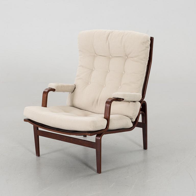 AN ARM CHAIR, By Bruno Mathsson Dux, late 20th century,