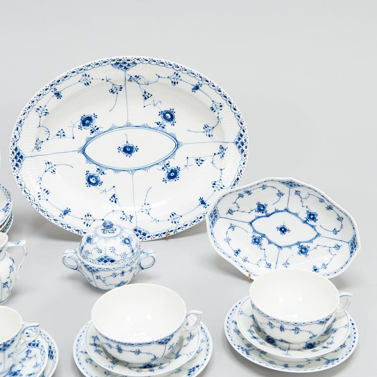 A set of 21 pieces Royal Copenhagen Blue Fluted Half-lace porcelain.