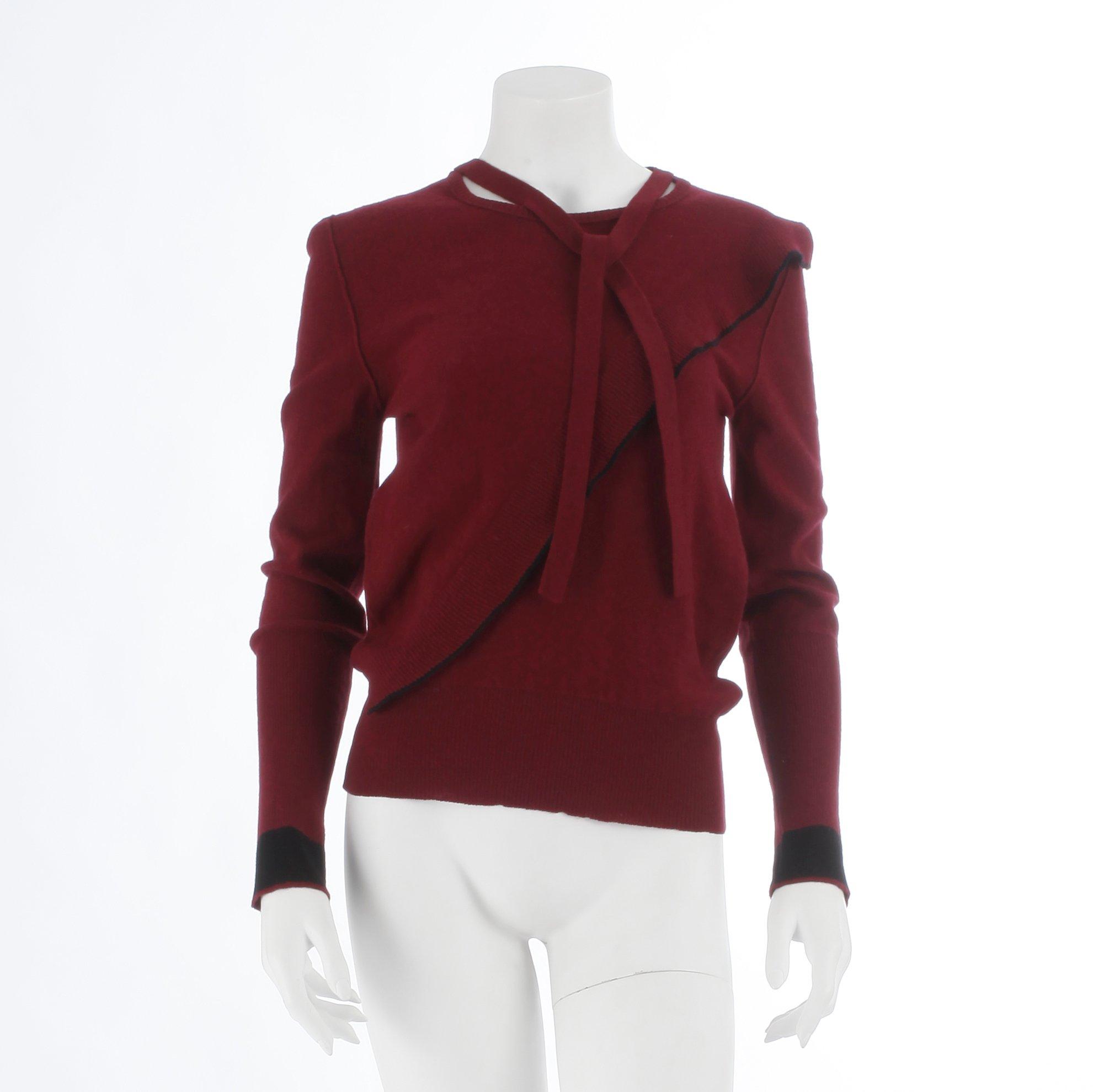 SONIA RYKIEL, a burgundy red wool sweater.