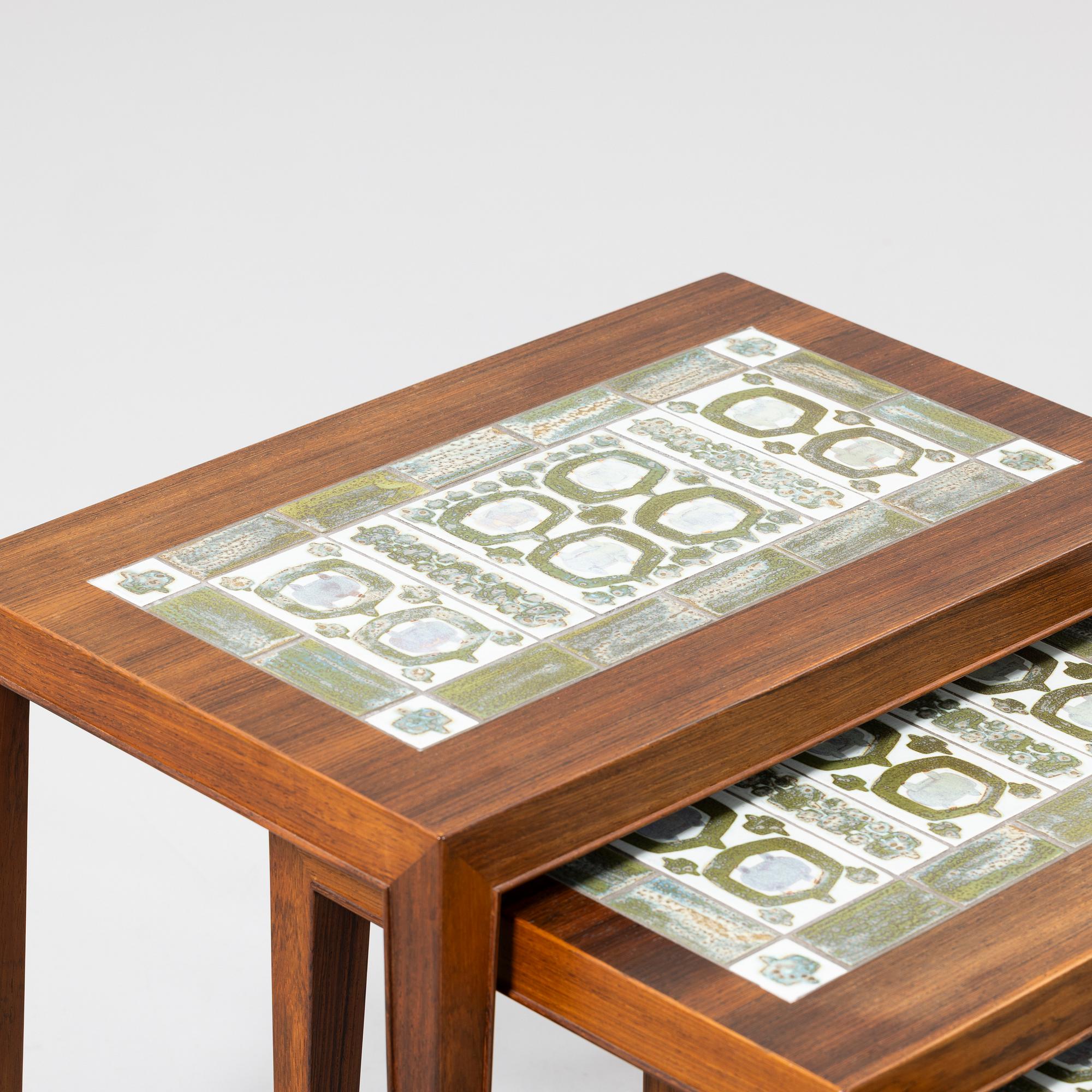 Nest of tables, three pieces, Denmark, second half of the 20th century.