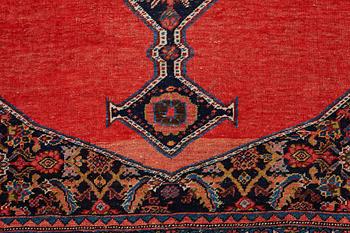 A CARPET, an antique Bidjar kelly, ca 587 x 230 cm.