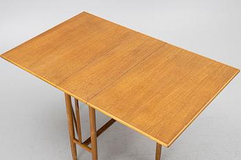 A mid20th century gate-leg table.