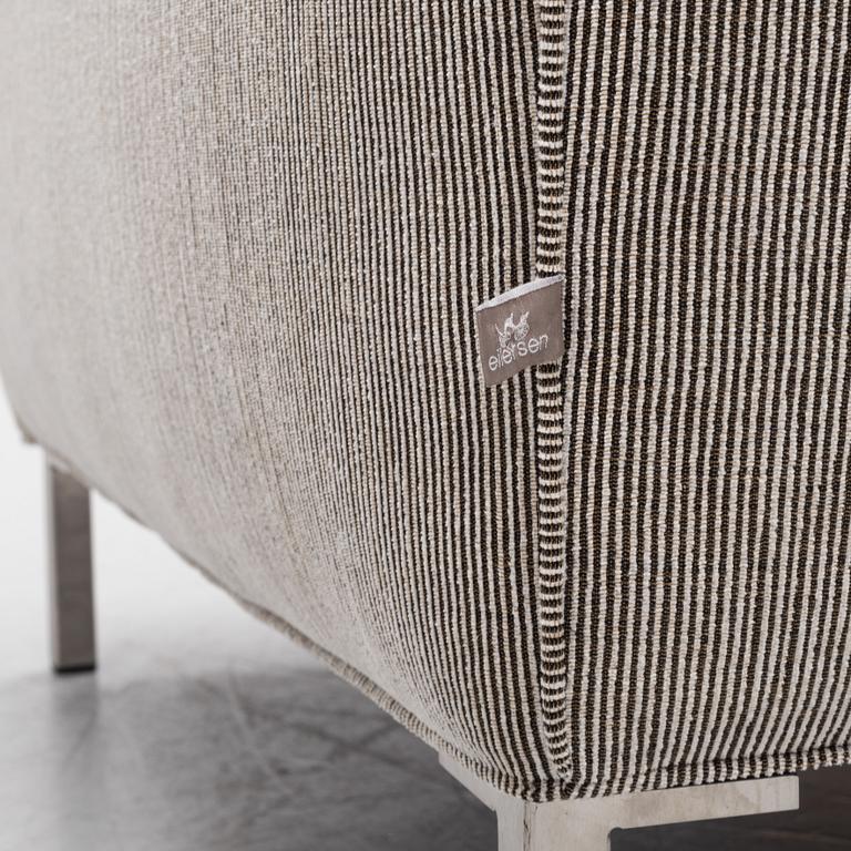 A 'Streamline' armchair with a foot stool, Eilersen.