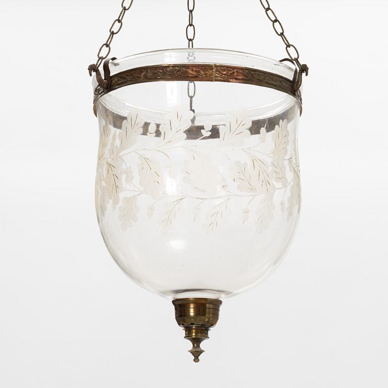 A glass and metal lantern, early 20th century.