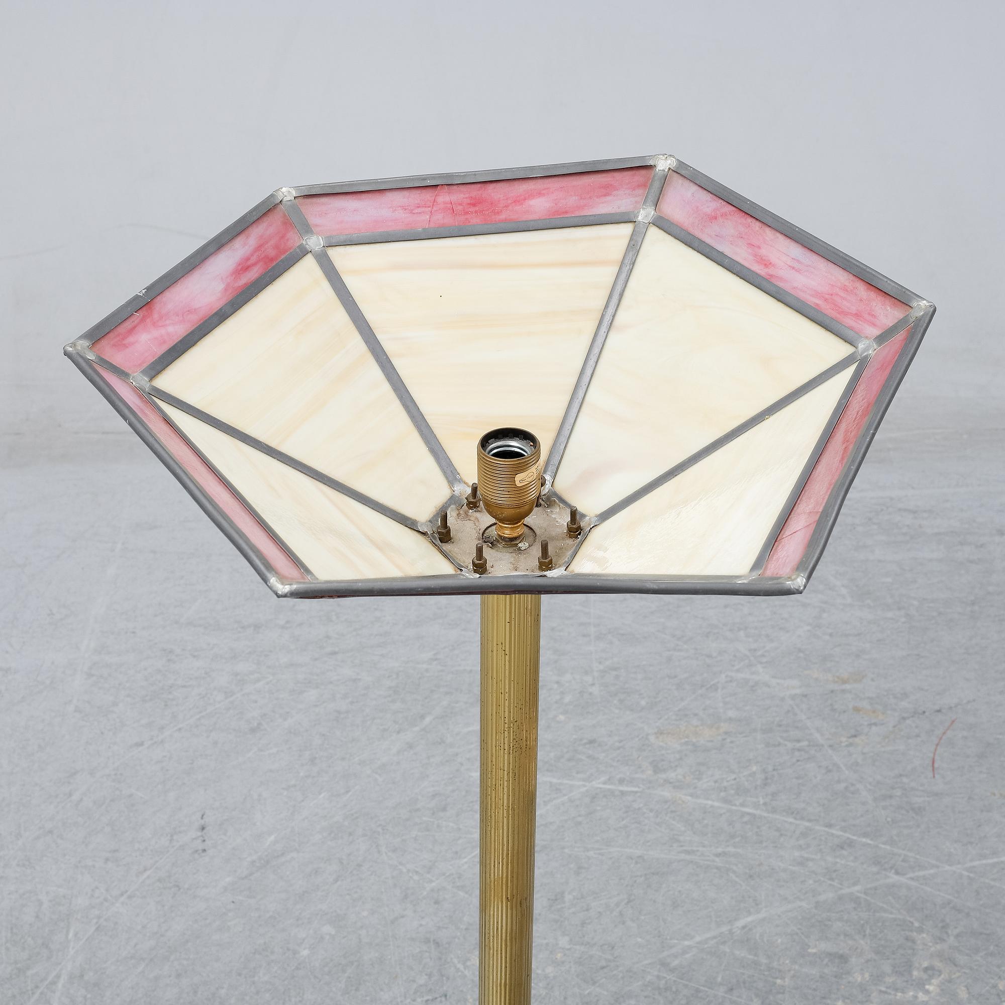 A pair of lamps, second hanf of the 20th Century.