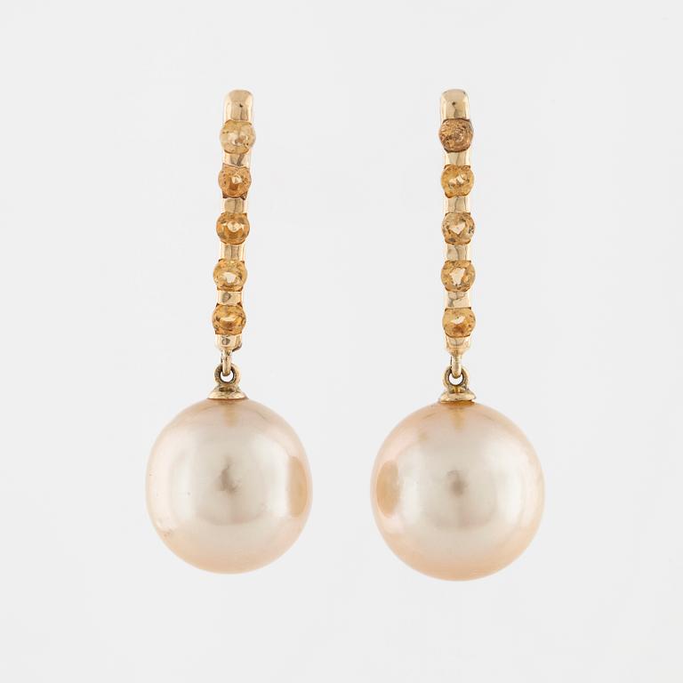 A pair of cultured pearl and faceted citrine earrings.