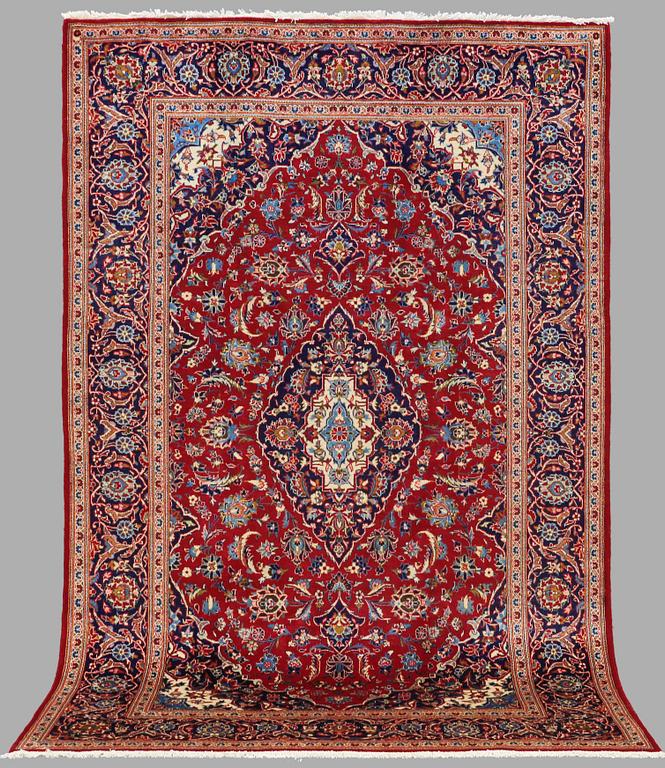 A CARPET KASHAN AROUND 305 X 195 CM.