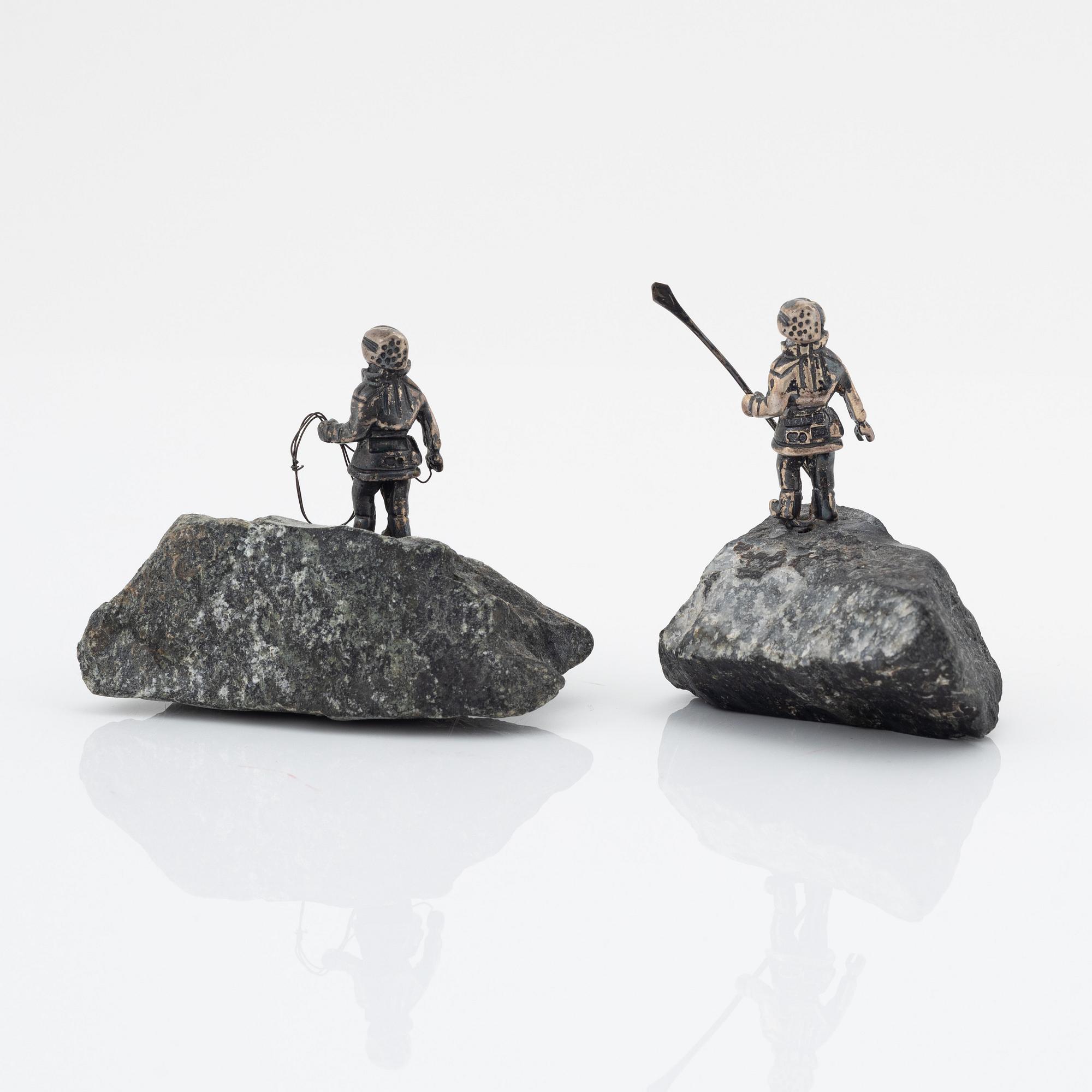 A pair of silver figurines, from MGAB, 1969.