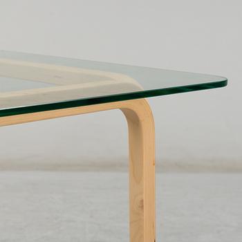 ALVAR AALTO, a pair of birch glass-top side tables from Arkek, Finland.