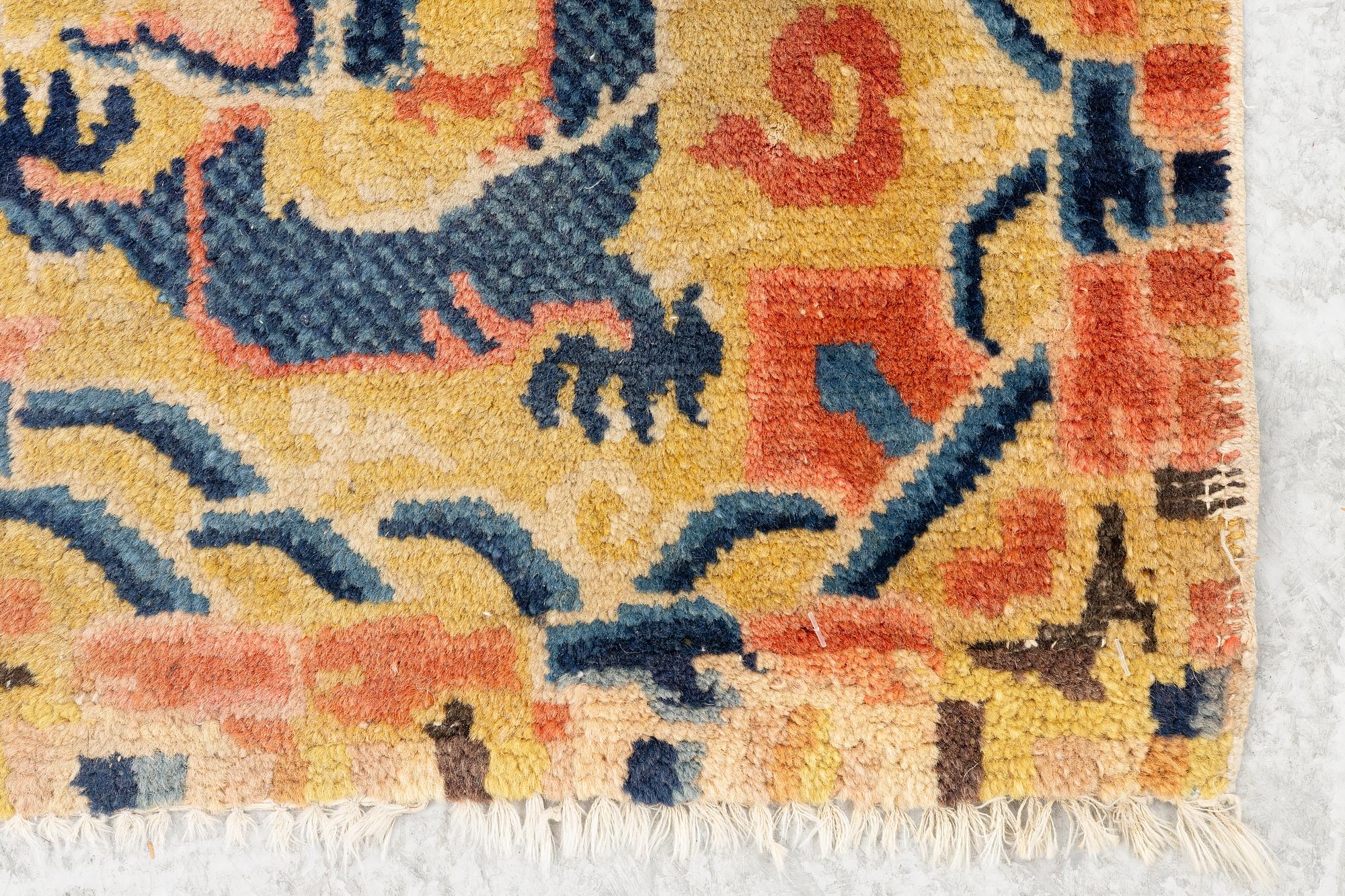 A Chinese antique Ningxia rug, late Qing dynasty, c. 128 x 67 cm.