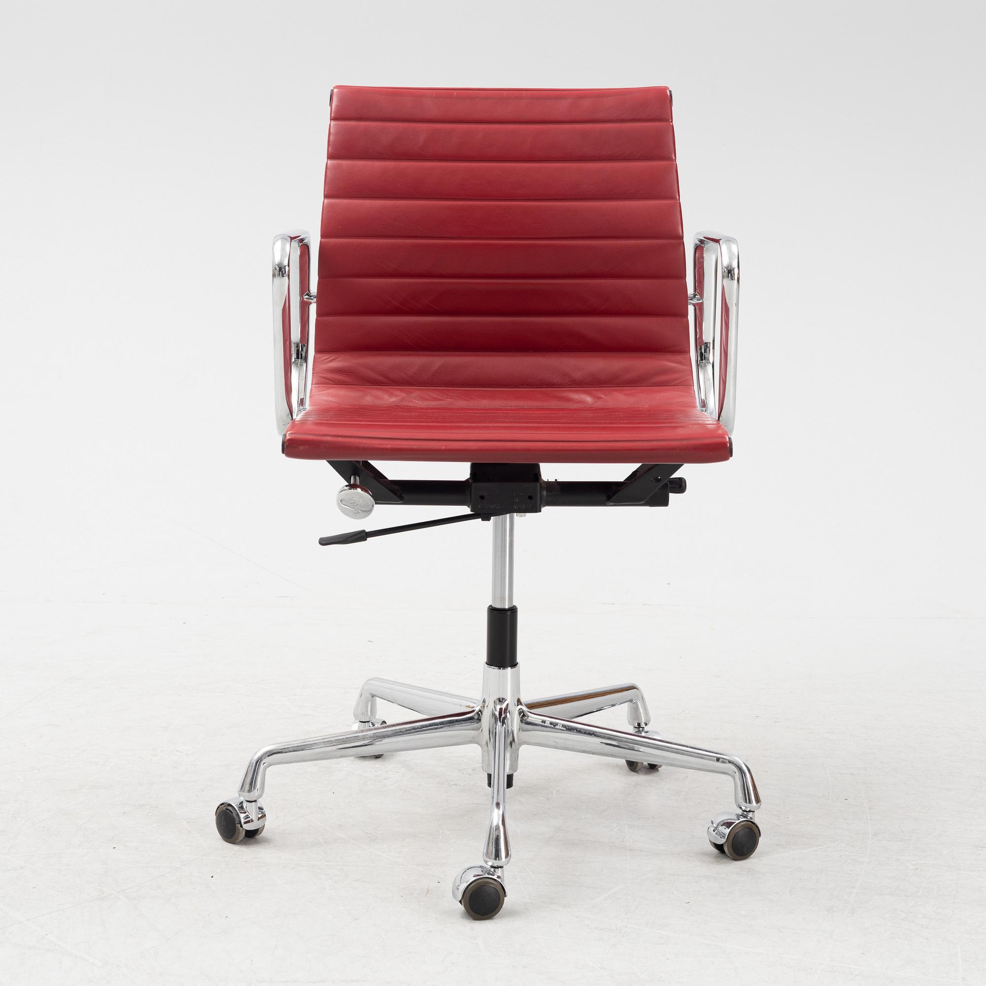 Charles & Ray Eames, a chrome swivel chair 'EA 118', Vitra.