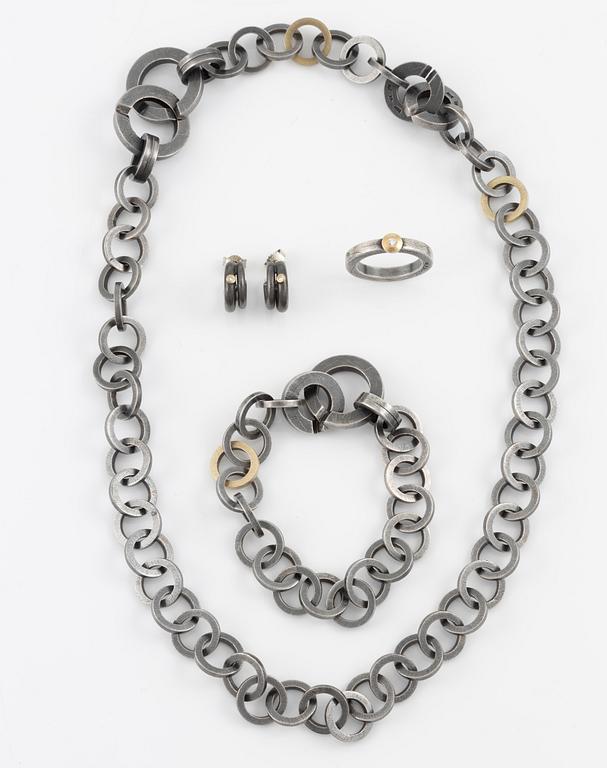 Bracelet, necklace, a pair of earrings, and a ring, Pia Rauff, silver with small diamonds.