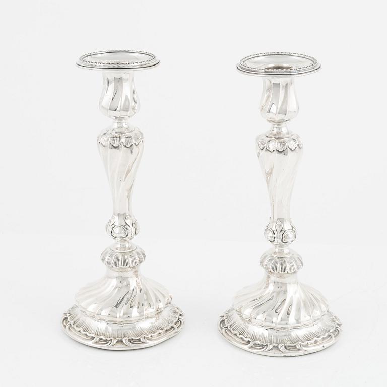 A pair of silver candle sticks by K Anderson Stockholm 1898.