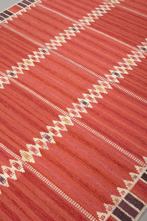 Barbro Nilsson, A CARPET, "Salerno kallröd med enkel bård", flat weave, ca 217 x 149,5 cm, signed AB MMF BN.