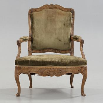 A Rococo 18th century armchair.