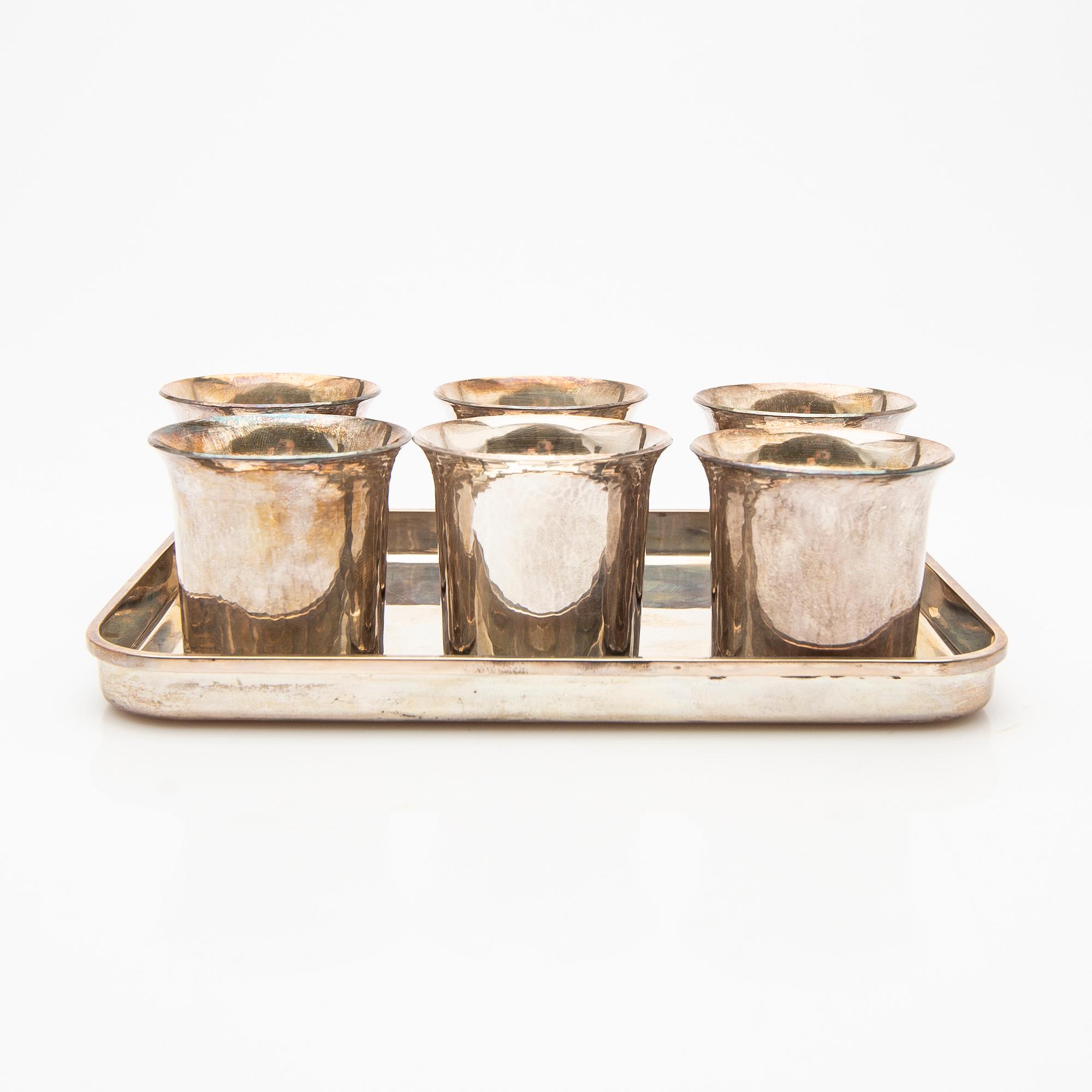 Cup and saucer set, 7 pieces, sterling silver, Einar Telander, Stockholm 1976-79.