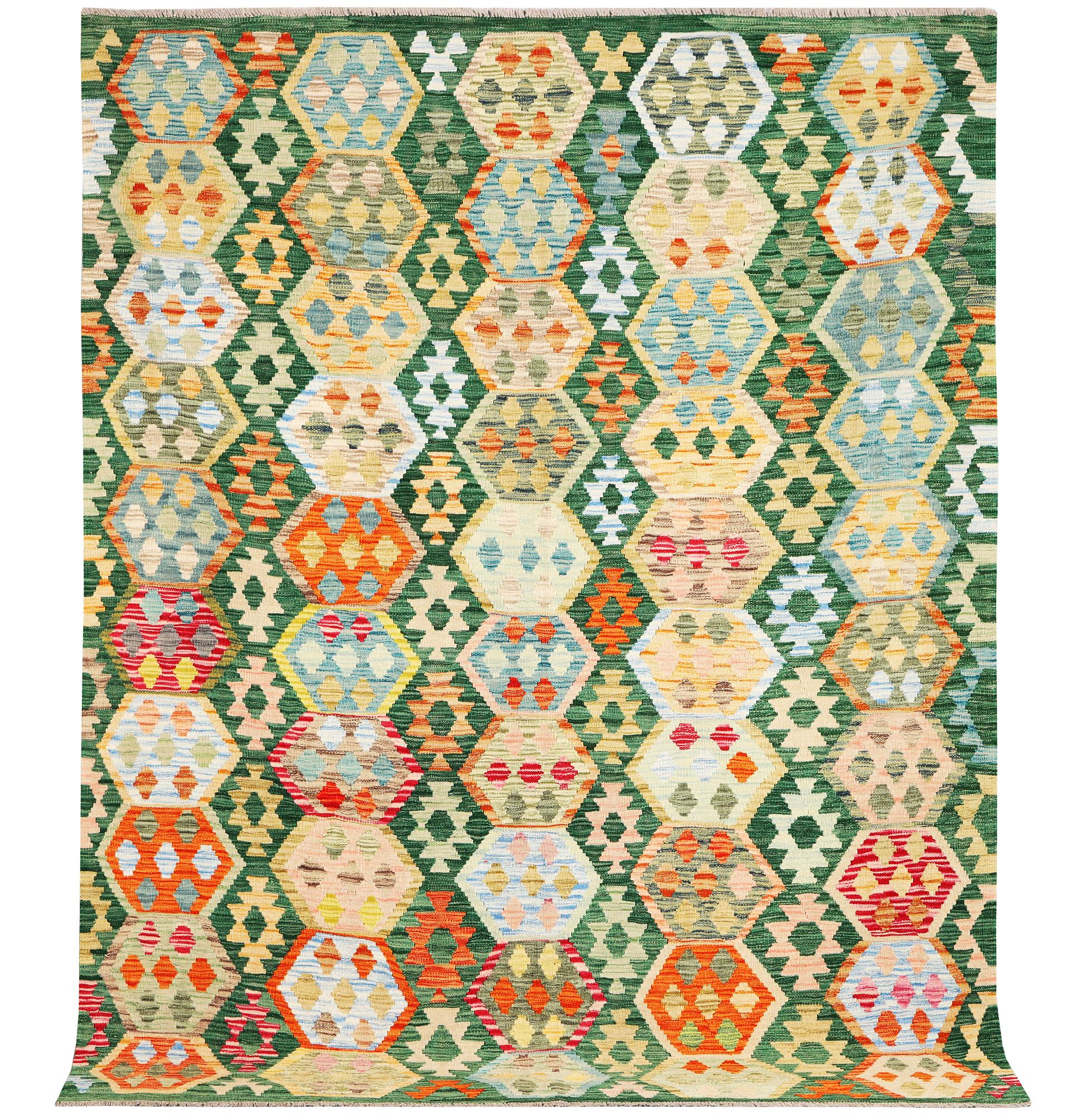 A Kilim carpet, c. 238 x 184 cm.