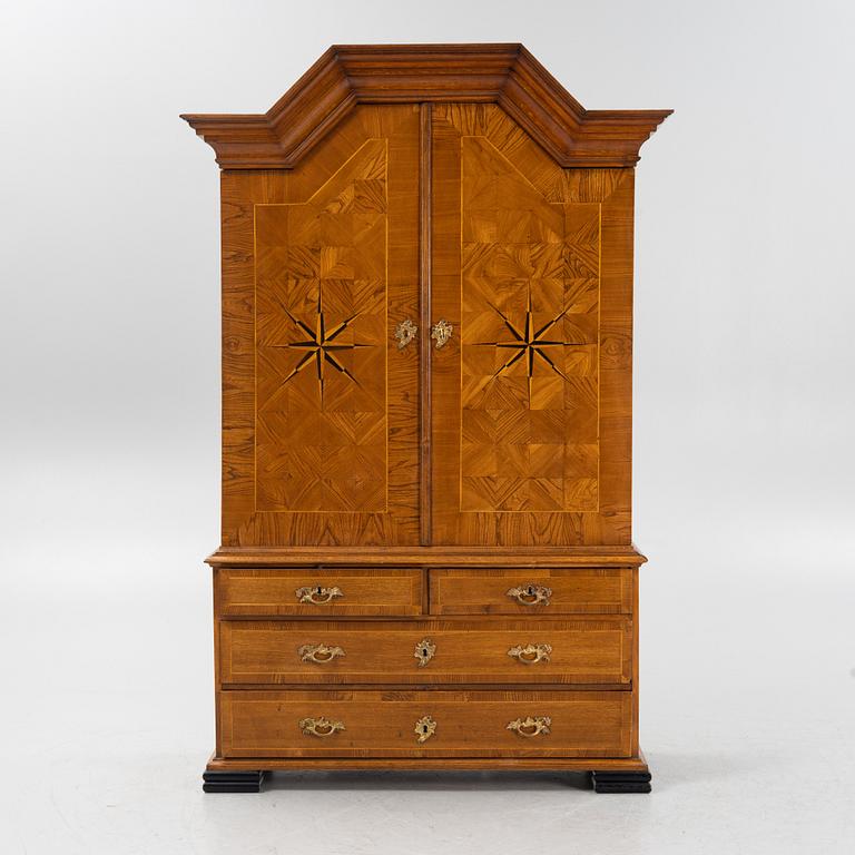 A late Baroque oak cabinet, first part of the 18th Century.