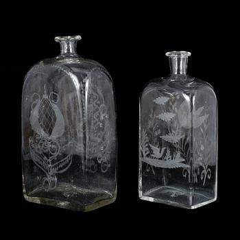 BRÄNNVINSFLASKOR, 2 st, glas, 1800-tal.