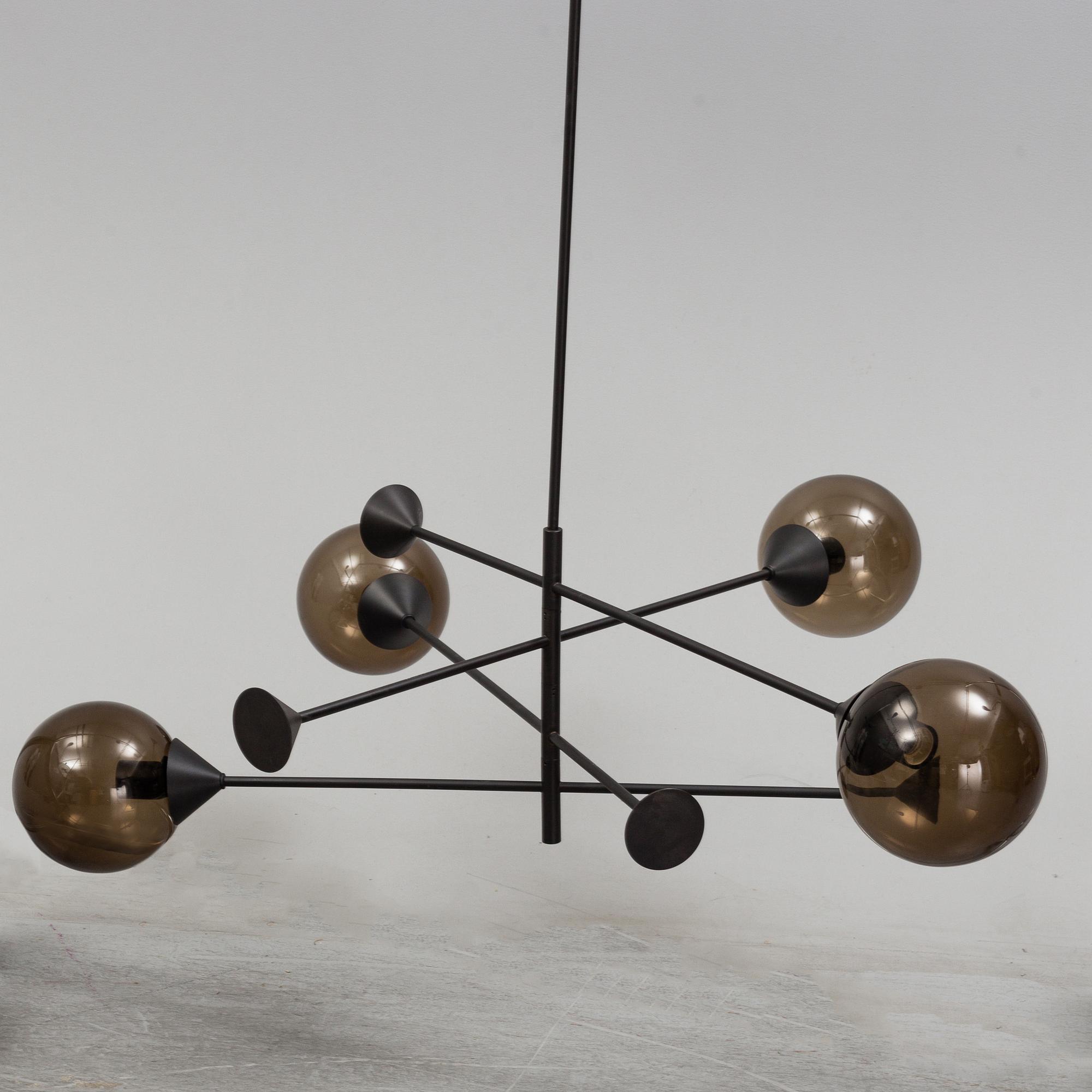 A 21st century "Kendama" LED pendant lamp, design Massimo Zazzeron, Giorgetti.