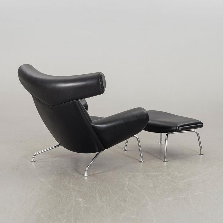 HANS J WEGNER, "Ox chair" lounge chair and stool.