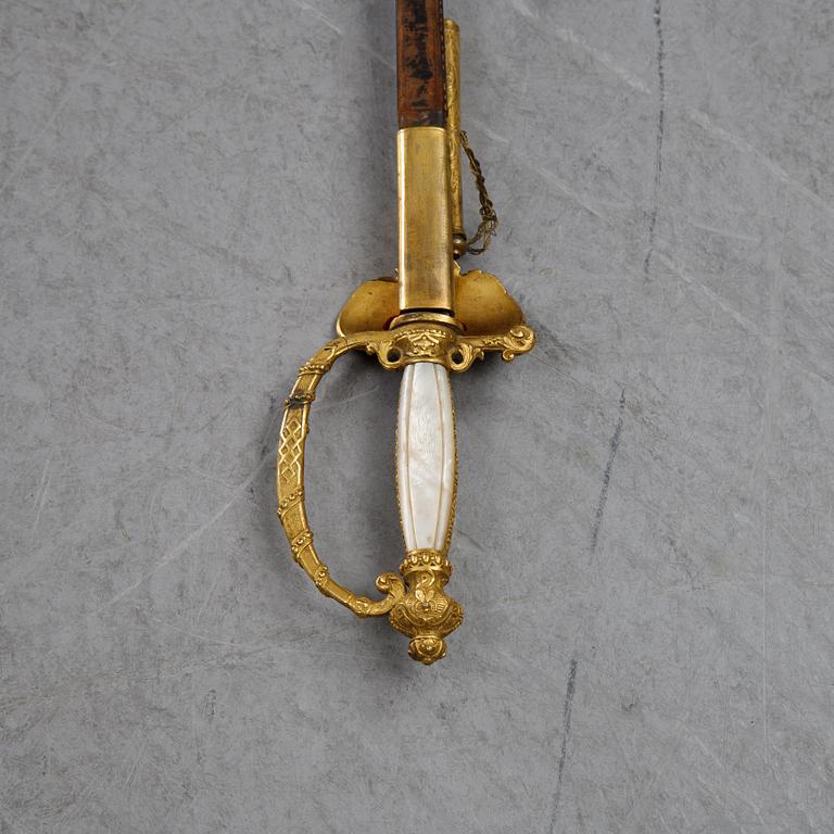 A french small sword with scabbard, early 19th Century.