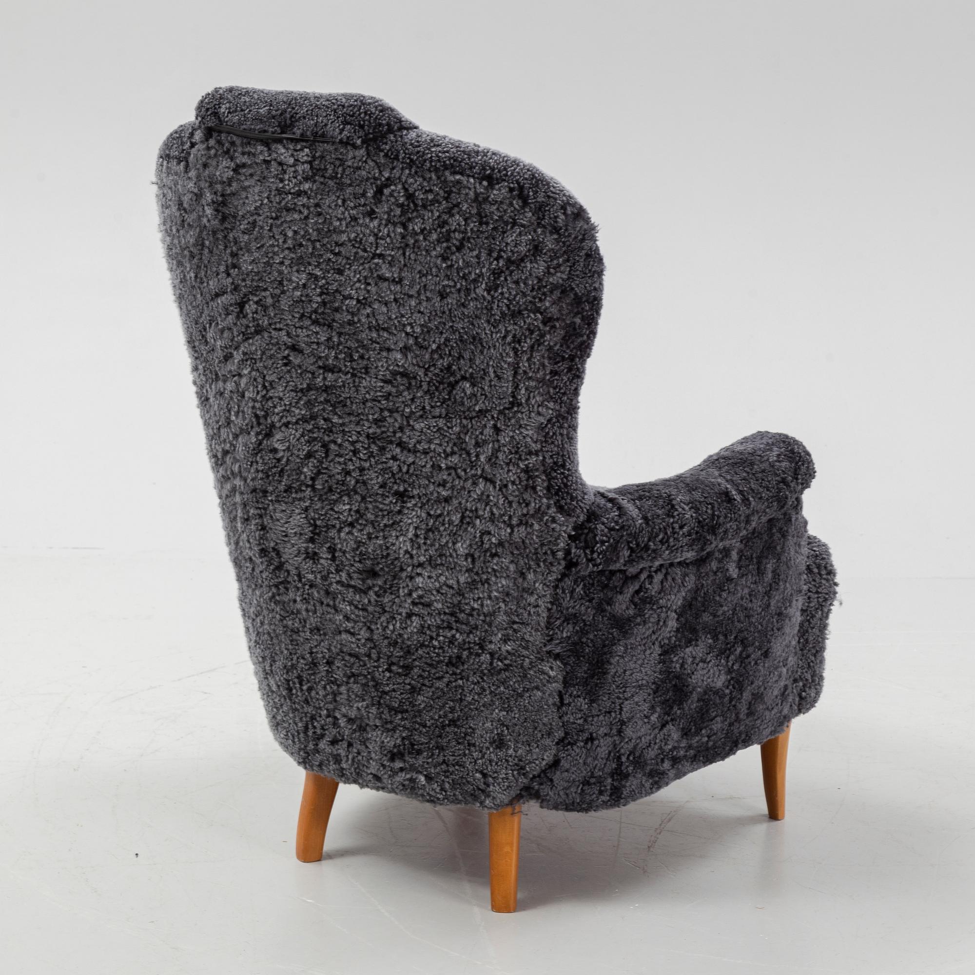 Carl Malmsten, a shearling upholstered 'Farmor' lounge chair from Oh Sjögren.