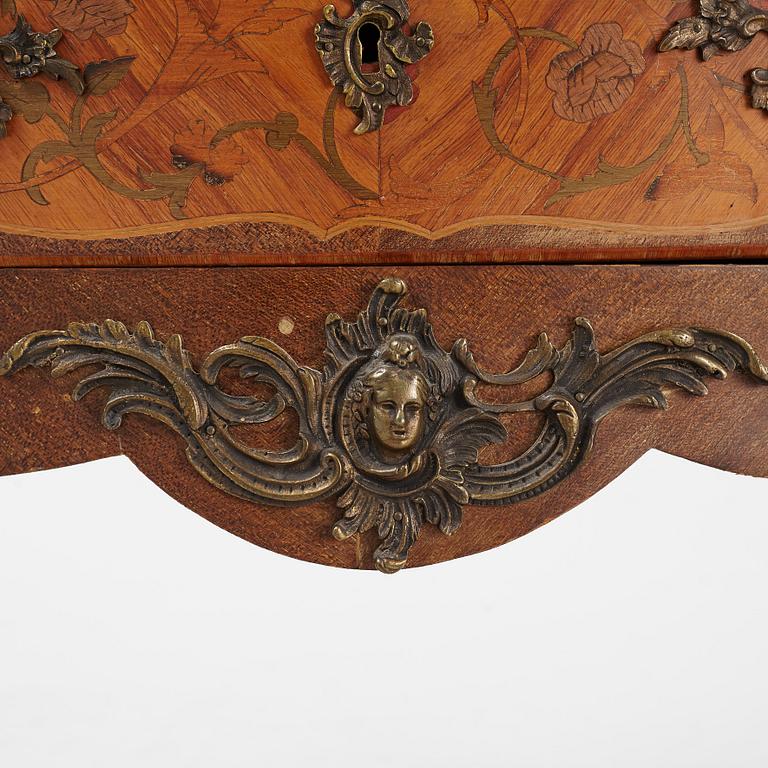 A Louis XV-style marquetry commode, first part of the 20th century.