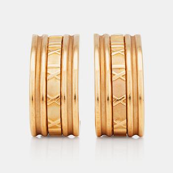 1090. A pair of Tiffany & co gold earrings.