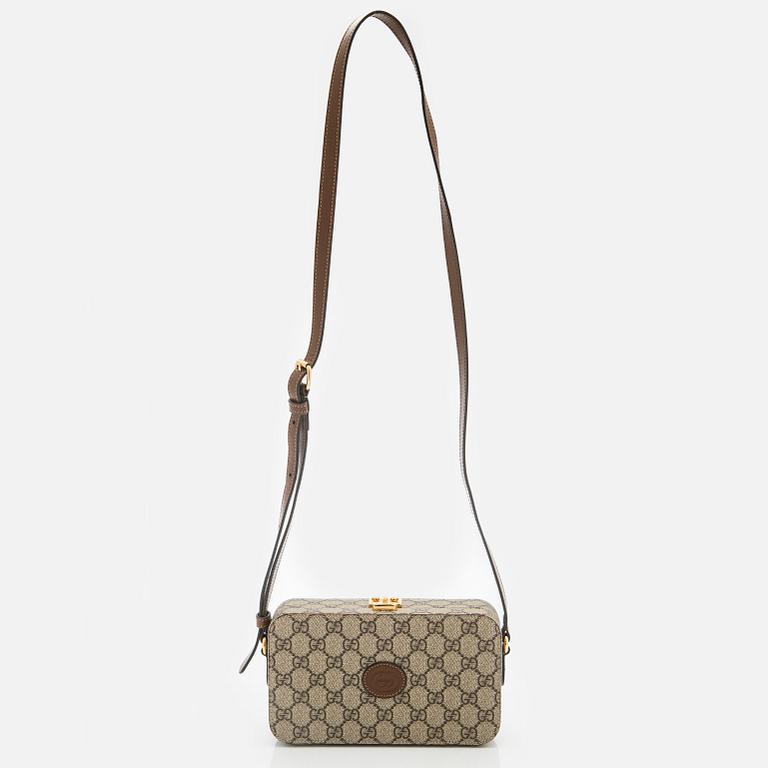 Gucci, "GG Supreme" laukku.