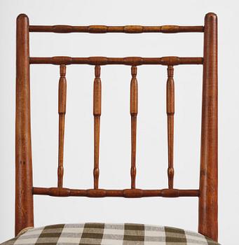 A set of four late Gustavian faux bamboo chairs by J. E. Höglander (master in Stockholm 1777-1813).