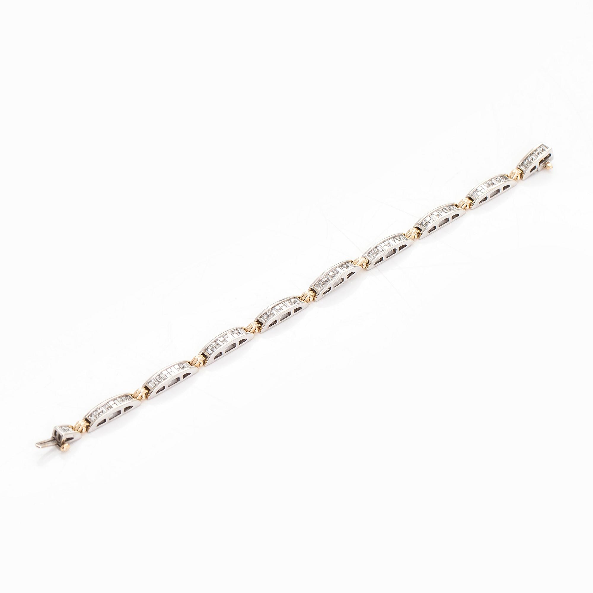 Rannekoru, 14K kultaa/valkokultaa prinsess- ja baguettehiottuja timantteja.