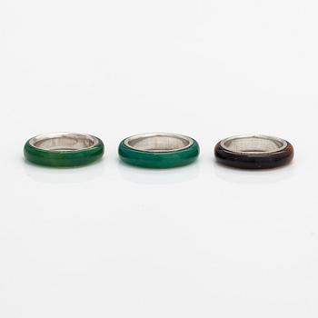 A set of three sterling silver rings, two with chalcedony and one with tiger's eye. Kultakeskus, Hämeenlinna.