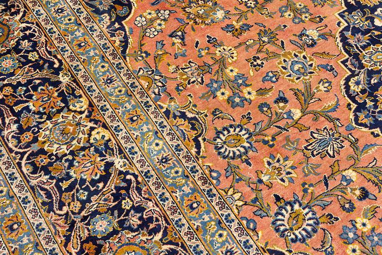 A Keshan older carpet, 430 x 305 cm.
