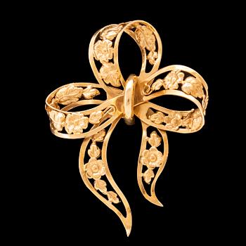 Brosch 18K guld Stockholm 1947.