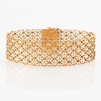 Armlänk, 18K guld, x-länk,  Ädelsmycken  AB, Stockholm 1969.