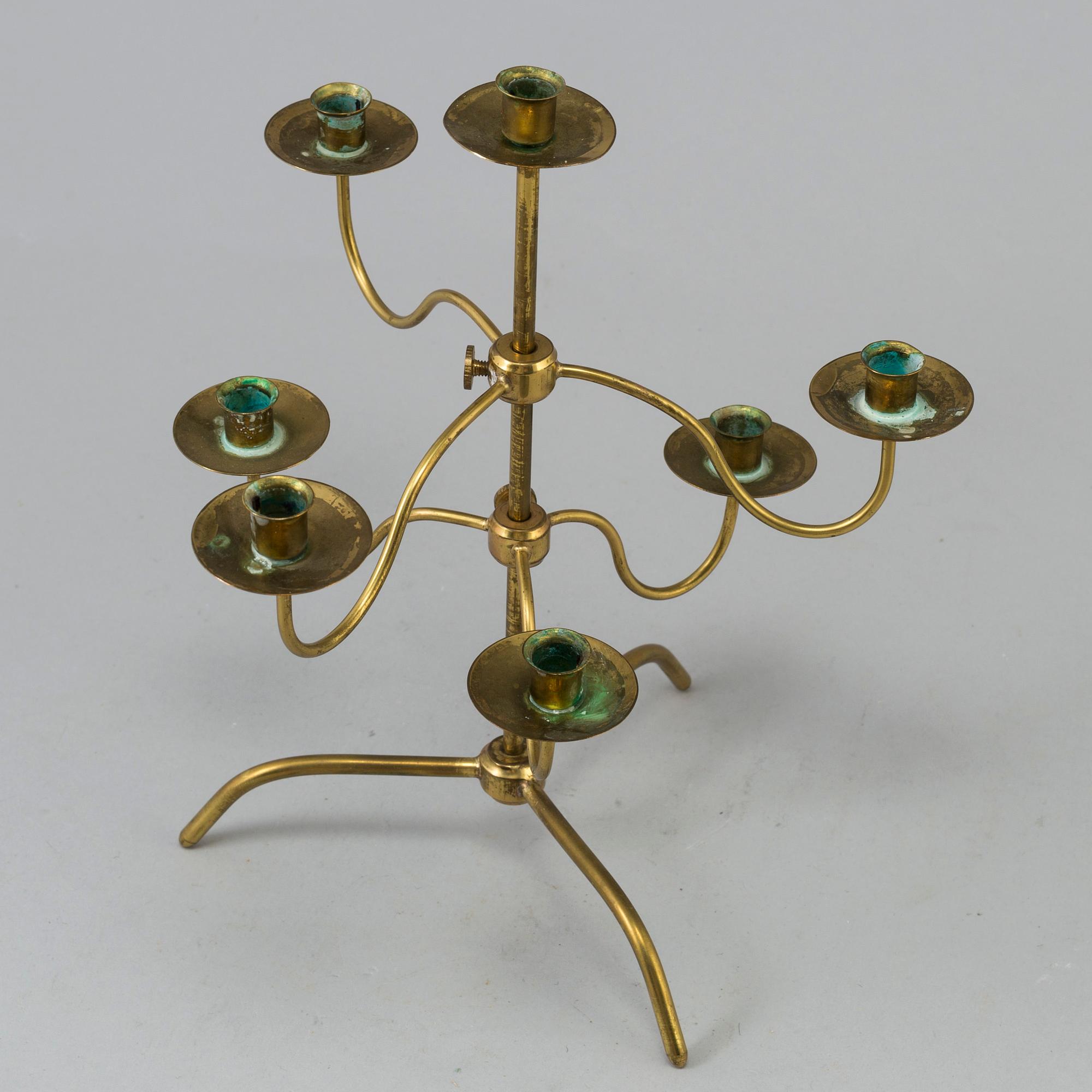 A brass kandelabra model 2454 by Josef  Frank for Firma Svenskt Tenn.