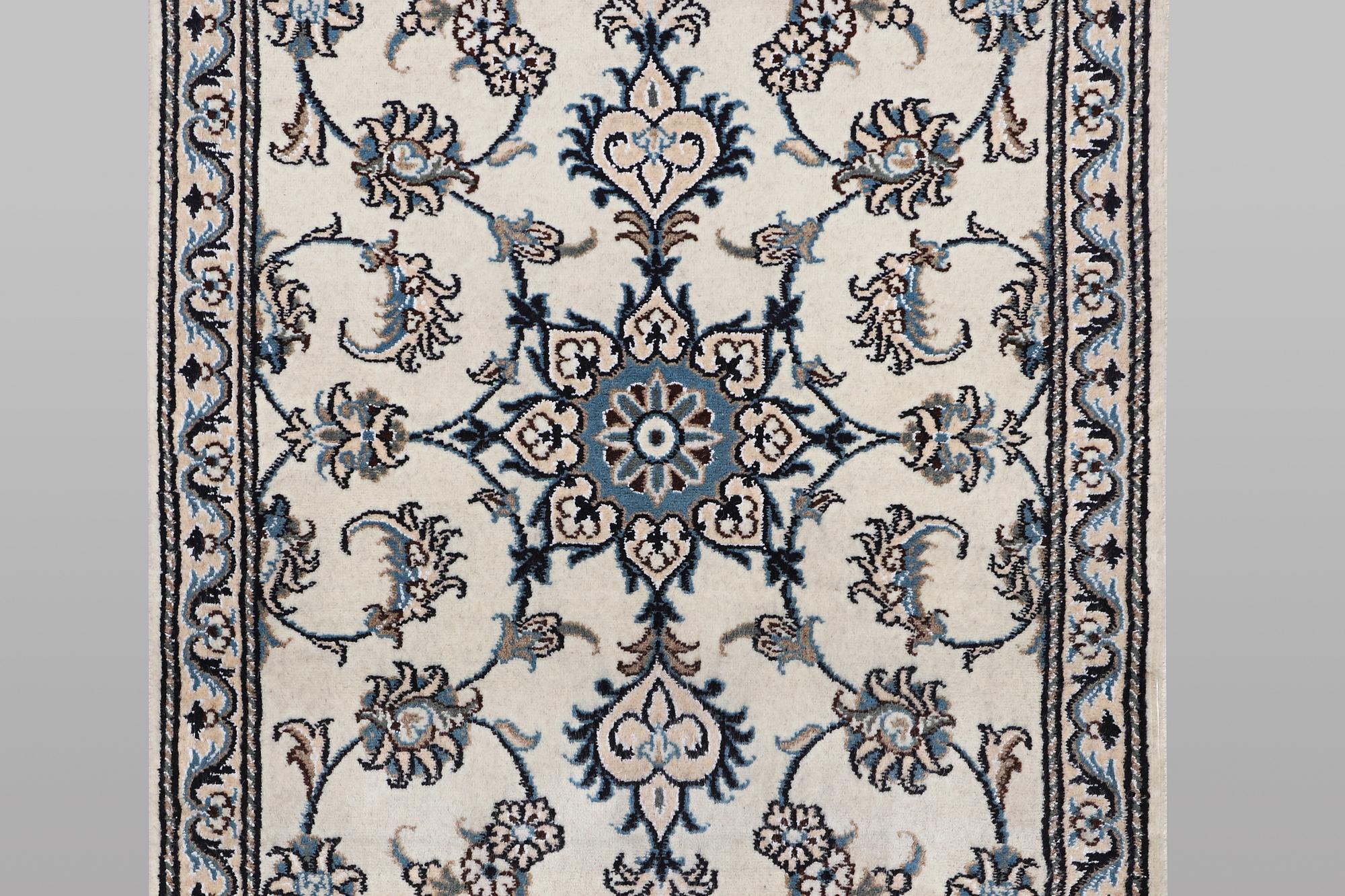 A runner carpet, Nain, part silk, ca 197 x 77 cm.